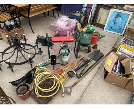 AN ASSORTMENT OF GARDEN ITEMS TO INCLUDE A SCOTTS SEEDER, A CHRISTMAS TREE STAND AND TOOLS ETC 