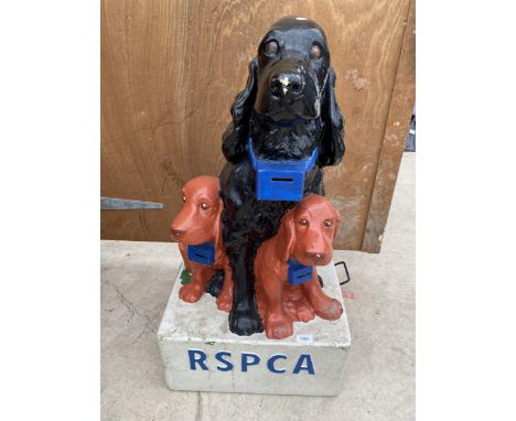 A VINTAGE RSPCA COLLECTION MONEY BOX WITH A DOG AND TWO PUPPIES 