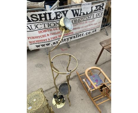 A GILT FLOOR LAMP AND A STICK STAND 