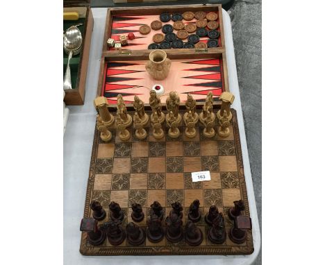 A WOODEN CHESS BOARD WITH RESIN ROMAN FIGURE CHESS PIECES - 3 A/F PLUS A BACKGAMMON/DRAUGTS BOARD WITH COUNTERS 