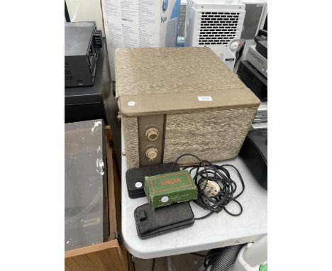 A STEREO RECORD PLAYER AND VARIOUS SINGER SEWING MACHINE SPARES 