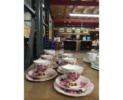 A KENT CHINA TEASET IN A PALE PINK WITH ROSE DESIGN TO INCLUDE CAKE PLATE, CREAM JUG, SUGAR BOWL, CUPS, SAUCERS AND SIDE PLAT