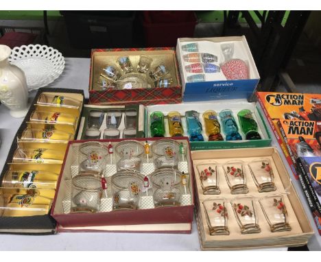 A QUANTITY OF VINTAGE BOXED GLASSES TO INCLUDE THEMED LIQUEUR GLASSES, ONE WITH A MATCHING DECANTER, VINTAGE CAR TUMBLERS PLU