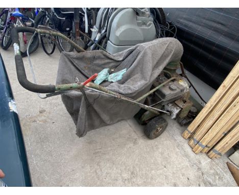 A VINTAGE PETROL ENGINE BILLY GOAT GARDEN VACUUM 
