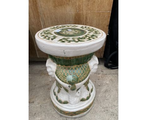 AN ORIENTAL STYLE CERAMIC JARDINIERE 