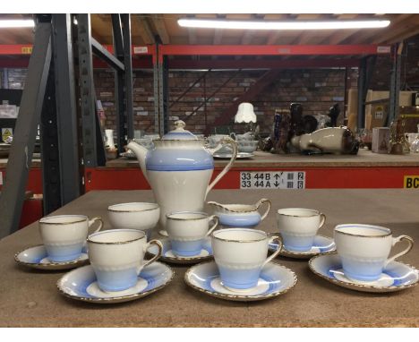 A VINTAGE J &amp; G MEAKIN COFFEE SET IN PALE BLUE AND CREAM TO INCLUDE COFFEE POT, CREAM JUG, SUGAR BOWL, SIX CUPS AND SAUCE