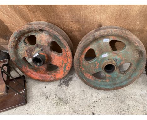 A PAIR OF VINTAGE INDUSTRIAL CAST IRON PULLEY WHEELS 