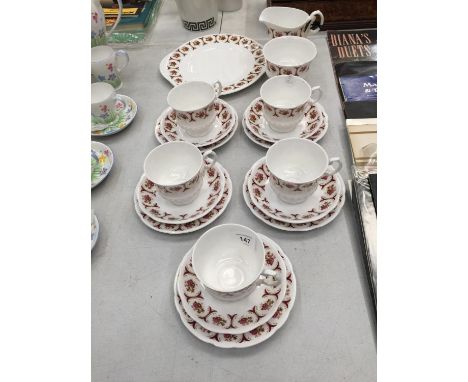 A CHINA PART TEASET 'DIANE' TO INCLUDE CUPS, SAUCERS, PLATES, CREAM JUG AND SUGAR BOWL 