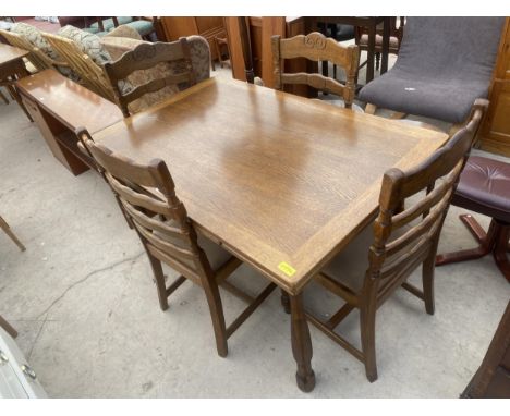 AN OAK DRAW LEAF DINING TABLE AND FOUR LADDER BACK DINING CHAIRS 