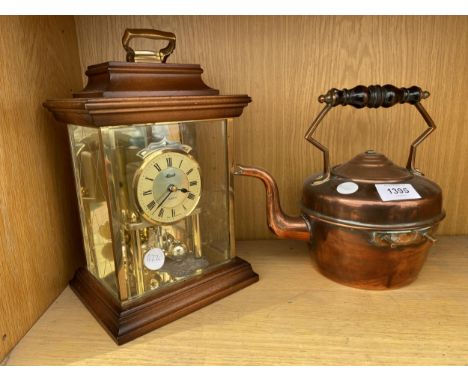 A COPPER KETTLE AND A MANTLE CLOCK 