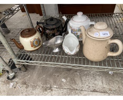 AN ASSORTMENT OF CERAMIC TEA POTS 