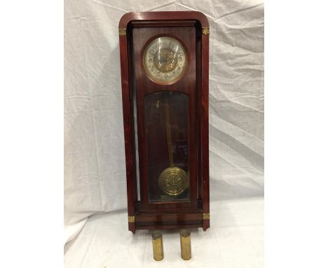 AN ART NOUVEAU STYLE MAHOGANY CASED WALL CLOCK WITH BRASS AND SILVERED DIAL 