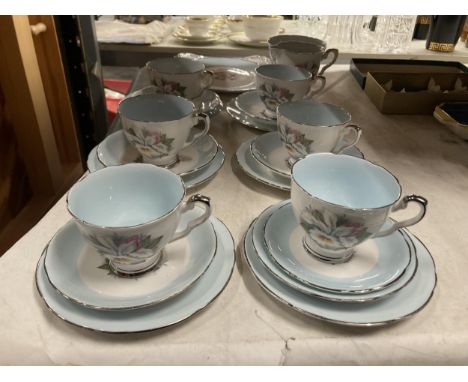 A ROYAL STAFFORD 'WHITE LADY' TEASET TO INCLUDE A CAKE PLATE, CUPS, SAUCERS, SIDE PLATES, CREAM JUG AND SUGAR BOWL 