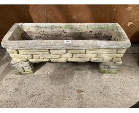 A RECONSTITUTED STONE TROUGH PLANTER 