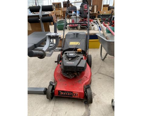 A CHAMPION LAWN MOWER WITH HONDA PETROL ENGINE AND GRASS BOX 