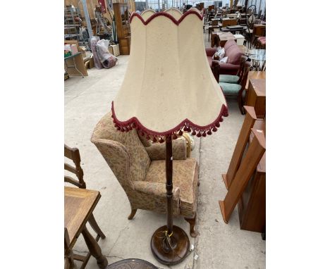 AN OAK STANDARD LAMP 