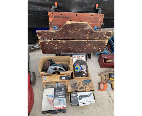 AN ASSORTMENT OF TOOLS TO INCLUDE A BLACK AND DECKER GRINDER, A BLACK AND DECKER CIRCULAR SAW AND TWO FOLDING WORK MATES ETC 