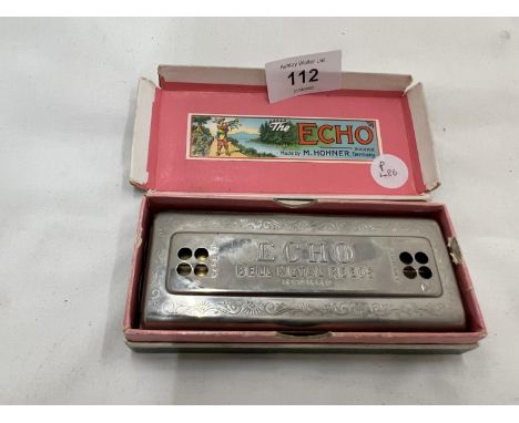 A VINTAGE HOHNER HARMONICA 'THE ECHO HARP' 