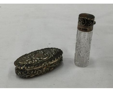 A BIRMINGHAM HALLMARKED SILVER ROCOCO STYLE TRINKET BOX AND SILVER LIDDED SCENT BOTTLE. WEIGHT: 33 GRAMS 