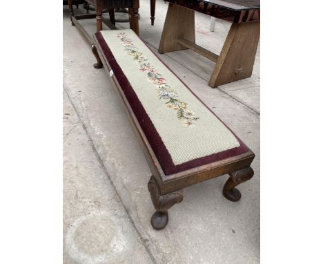 A LONG VICTORIAN MAHOGANY STOOL WITH TAPESTRY UPHOLSTERY 