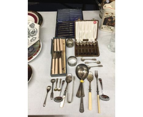 A QUANTITY OF VINTAGE FLATWARE TO INCLUDE COFFEE BEAN SPOONS IN BOX, TWO SETS OF KNIVES IN BOXES, MUSTARD SPOONS, SUGAR TONGS