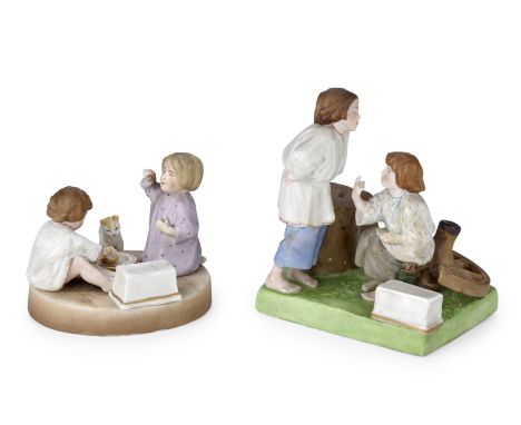 Two porcelain pen rests modelled as groups of playing childrenGardner Porcelain Factory, Verbilki, late 19th centuryfirst: mo