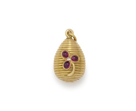 A jewelled gold miniature egg pendantFabergé, workmaster Henrick Wigstrom, 1908-1917body with lobed design reminiscent of bee