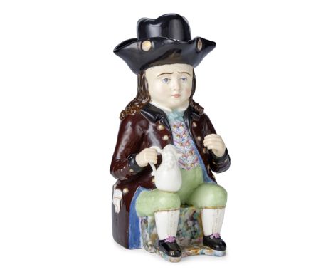 A large porcelain beer pitcher in a shape of a seated burgherMiklashevsky Factory, Volokitino, 1839-1861realistically, albeit