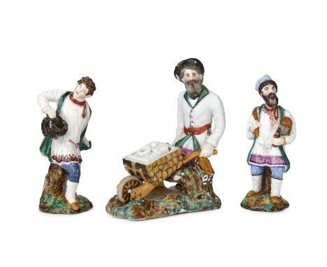 A group of three porcelain figuresfirst: possibly Popov Porcelain Factory, late 19th century; second and third: probably Kudi