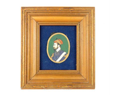 A 19th century oval portrait miniature on ivory, portrait of a Mogul Indian, 6.5 x 5cm, in a gilt frame.