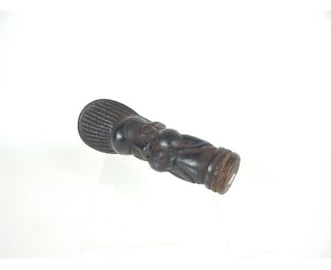 An early 20th century African tribal art terracotta pipe from Cameroon; 16cm long.