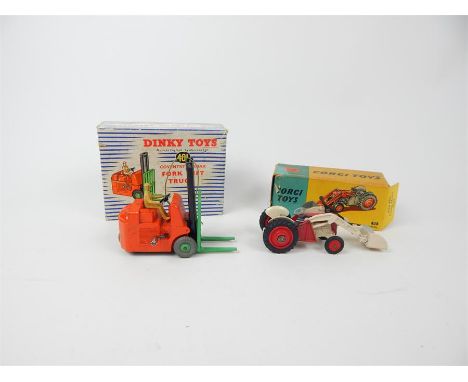 A Corgi Toys Massey-Ferguson 65 Tractor with shovel (53) with red and white paintwork and original box together with a Dinky 