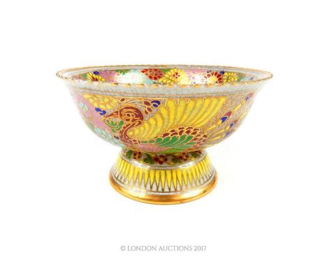 A Bencharong style porcelain bowl, the interior decorated with a portrait of a Thai king, 7cm high, 12cm wide.