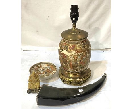 A Middle Eastern horn mounted in white metal mounts, (tests as silver) with etched decoration, length 36cm; a Japanese satsum