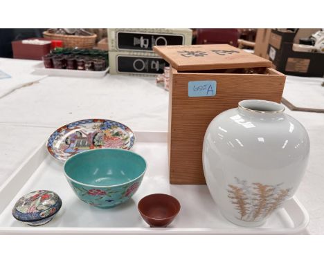 A Chinese turquoise ground rice bowl with floral painted decoration to exterior, plain interior, stamp to base, dia. 11cm; a 