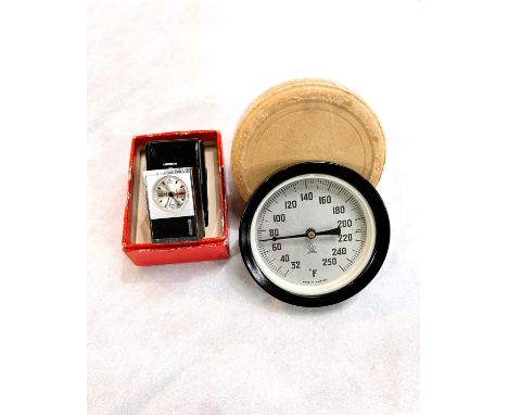 A circular vintage Swedish Fahrenheit thermometer in original box; a STOWA miniature wind up clock/alarm in original box and 