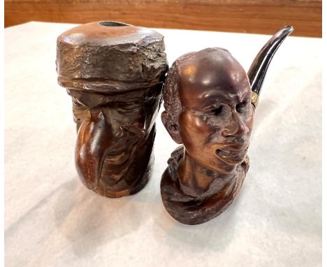 A Meerschaum tobacco pipe with carved figural bowl; a Black Forest style carve wood pipe&nbsp; 