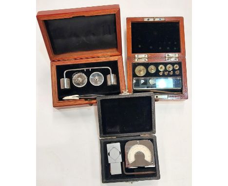 A Rubber Hardness scale instrument, 2 sets of precision weights 