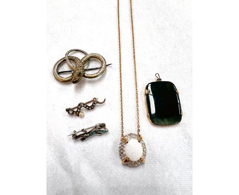 Vintage costume jewellery including a coiled snake with turquoise eyes, a snake set clear paste stones,a hardstone pendant an