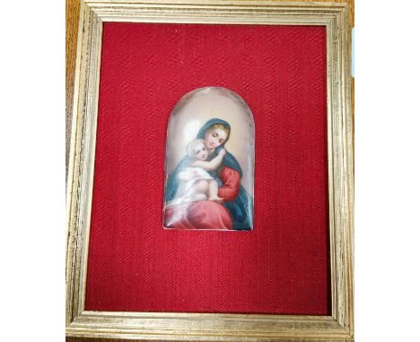 A classical hand painted Madonna and child ceramic on back, arch shaped 