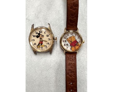 A vintage 'Mickey Mouse' wristwatch (no strap) and a Timex Winnie the Pooh child's watch 