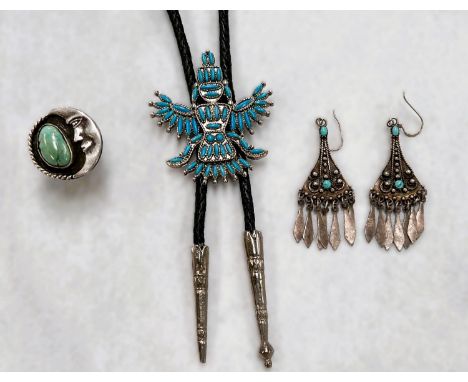 A pair of vintage white metal drop earrings embossed and each set with 2 turquoise colour stones, with arrow shape drops stam