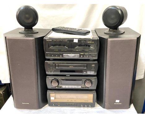 Technics CD Stereo System SC-CA1080 with Tuner, Amp, CD Player and Cassette Deck and 2 pairs of Speakers, instruction manual.