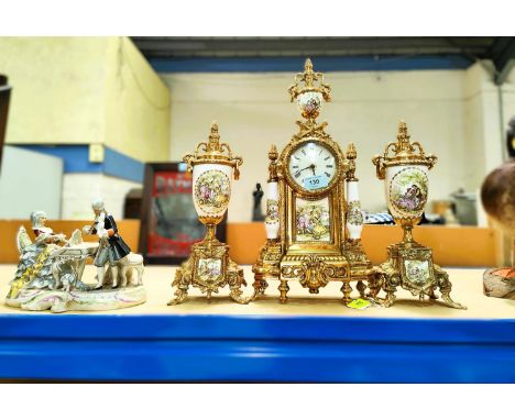 A traditional ceramic and metal three piece clock garniture with quartz movement, a Dresden style group etc&nbsp; 