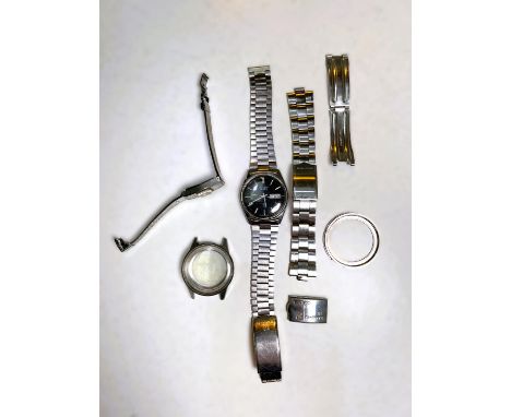 A selection of stainless steel gents wristwatches; 3 vintage gents wristwatches, cream faces, gilt crowns inc. Rodina, Timex,