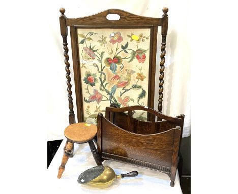 A needlework firescreen; a magazine rack; a footstool; a brass shovel 
