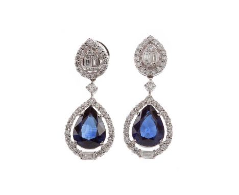 PAIR OF SAPPHIRE AND DIAMOND EARRINGS,the pear shaped sapphires totalling approximately 4.39 carats within diamond halos, sus