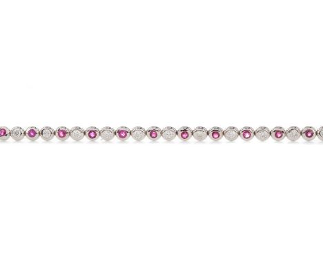 RUBY AND DIAMOND BRACELET,set with alternating bezel set rubies and diamonds, 17.5cm long, unmarked, 11.4gCondition report: L