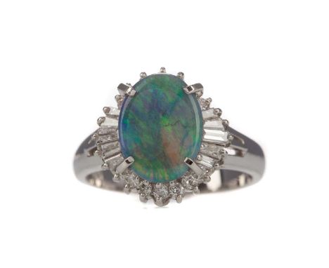 OPAL AND DIAMOND RING,the oval opal of approximately 1.78 carats, flanked by tapered baguette and round brilliant cut diamond