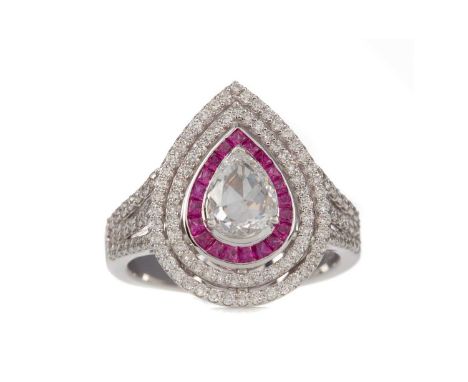 IMPRESSIVE RUBY AND DIAMOND RING,set with a pear shaped rose cut diamond of approximately 0.52 carats, within a ruby and diam
